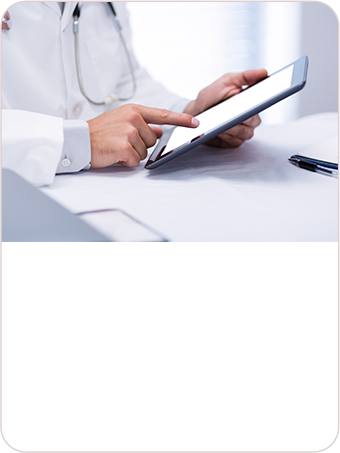 Doctor reviewing a treatment plan on a tablet